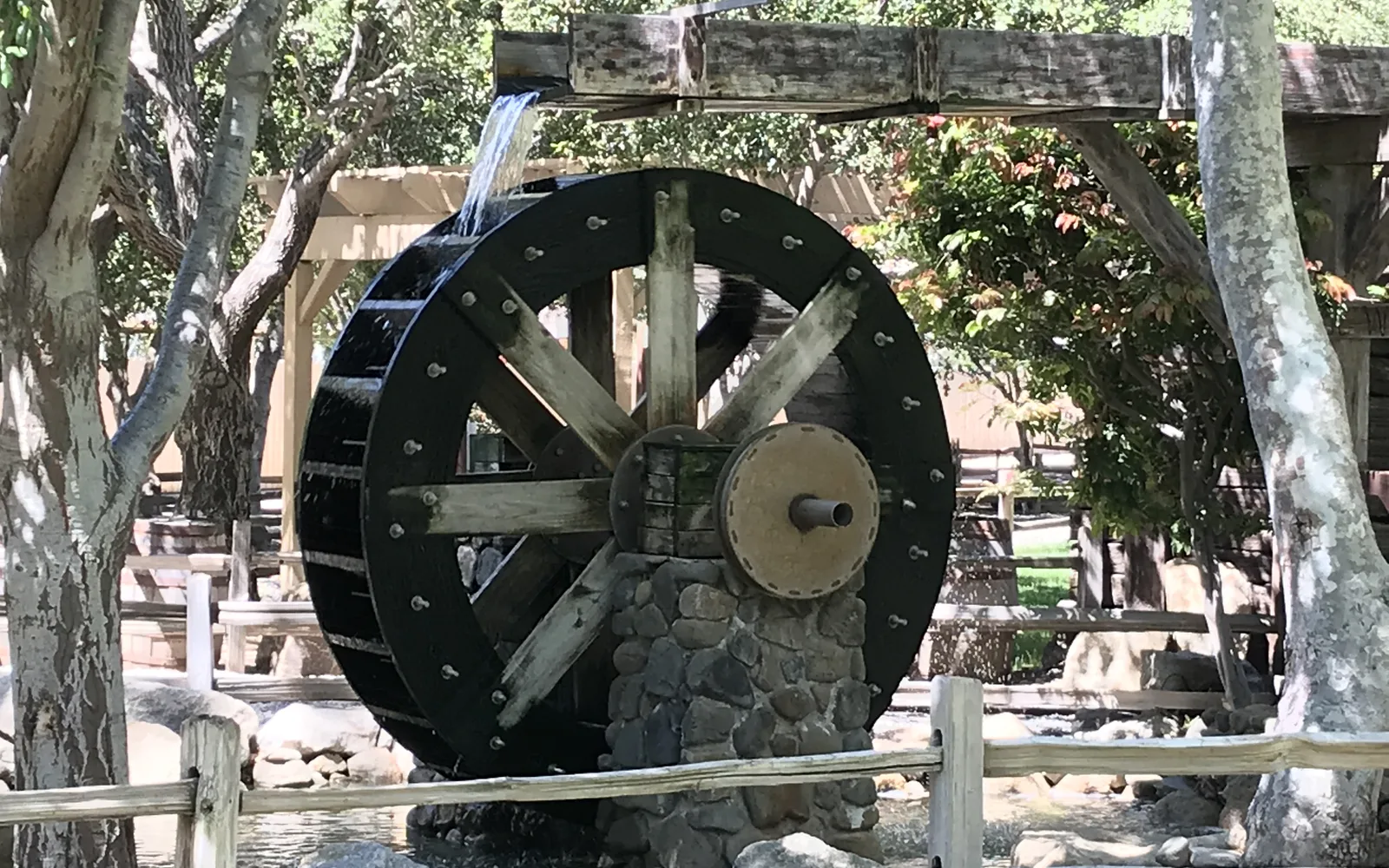 Historic waterwheel in Irvine Regional Park, representing family-friendly park facilities in Orange County